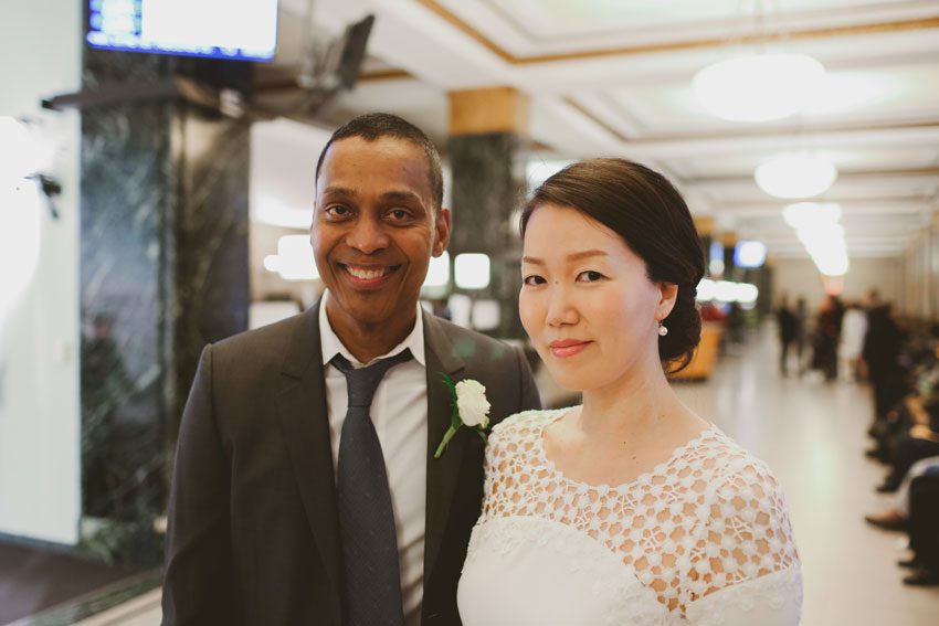 Multicultural couple getting married at NY City Hall