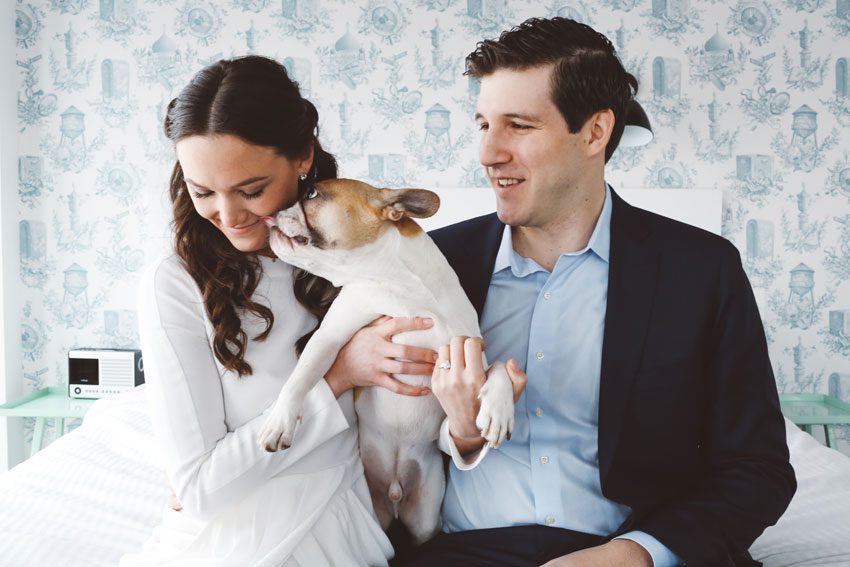married couple with puppy