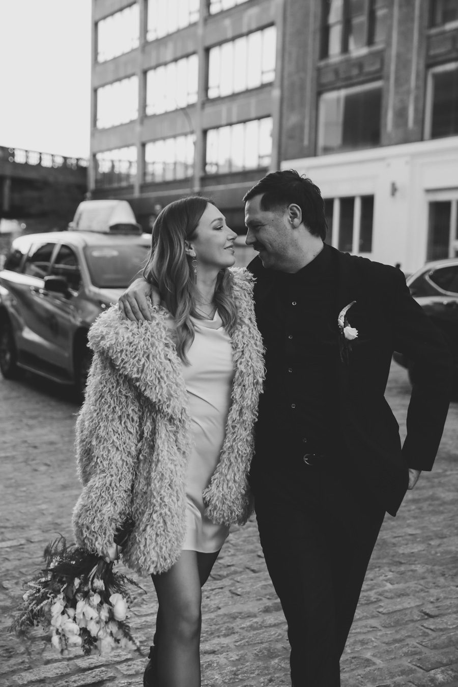 black and white shot of a couple eloping to NYC