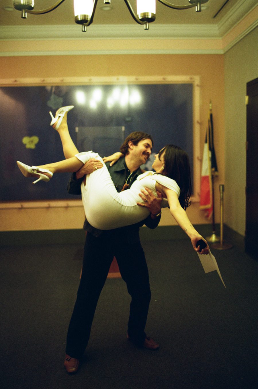 holding the bride at the City Hall in film